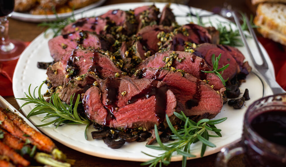 Herb Crusted Whole Bison Tenderloin with Mushrooms and Port Wine Sauce