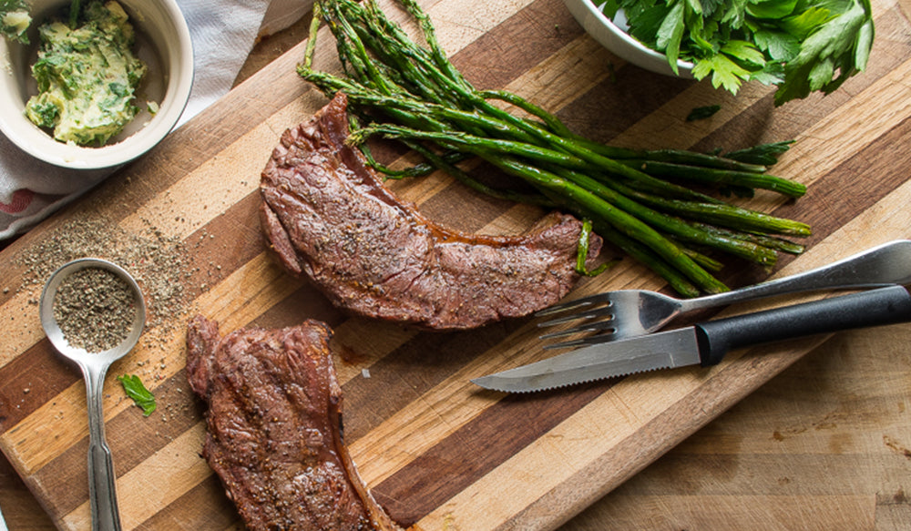 Perfect Grilled Steak with Roasted Garlic Herb Butter