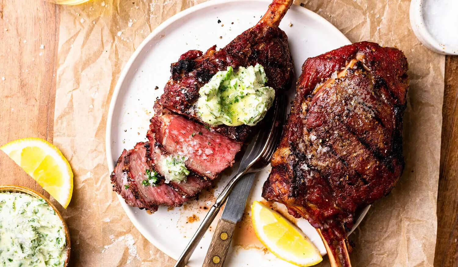 Grilled Bison Tomahawk Steaks with Chimichurri Butter